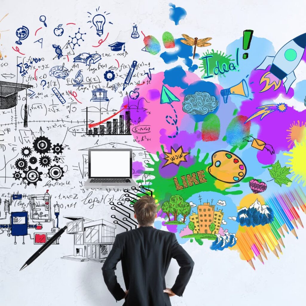 A businessperson standing in front of a wall filled with colorful drawings and sketches, representing art and creativity workbooks creation services.