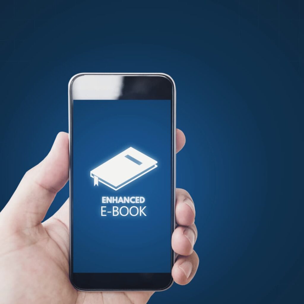 A hand holding a smartphone with an icon of a book and the words "ENHANCED E-BOOK," representing enhanced eBooks services.