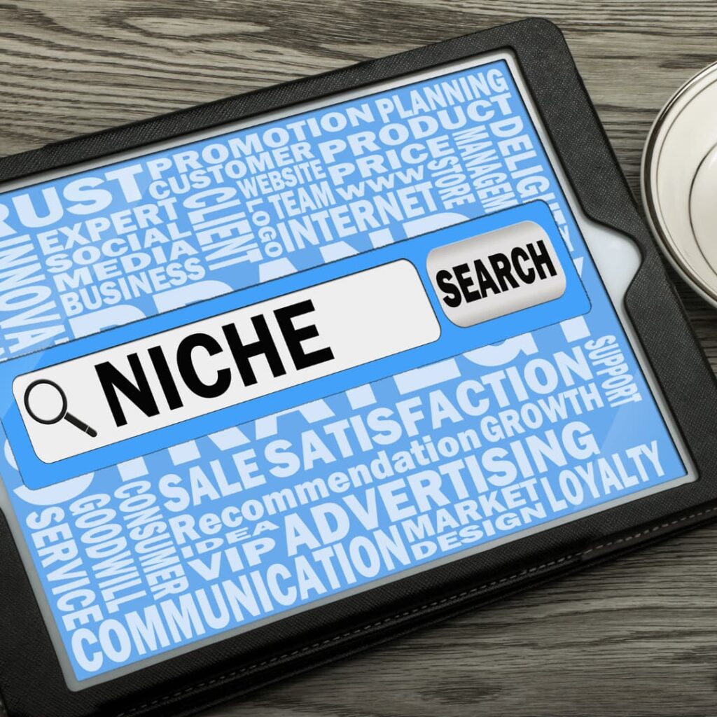 A tablet screen displaying the word 'Niche' surrounded by various related terms such as 'SEO,' 'Customer,' 'Product,' and 'Growth, indicating the expertise in diverse niches of SEO Blog writing services.