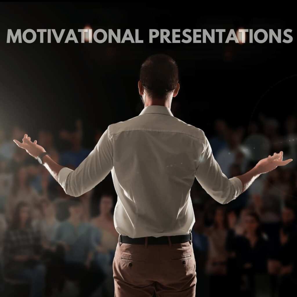 A speaker facing an audience with outstretched arms, with the words "MOTIVATIONAL PRESENTATIONS" at the top, indicating motivational PPT presentation creation services.